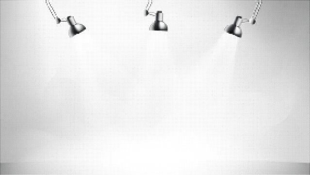 Vector illustration of three spotlights creating a spotlight halftone effect on white background