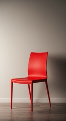 A bright, vivid red chair standing alone in a simple room, highlighting its intense color and modern design against a neutral background ,interior ,seating ,luxury