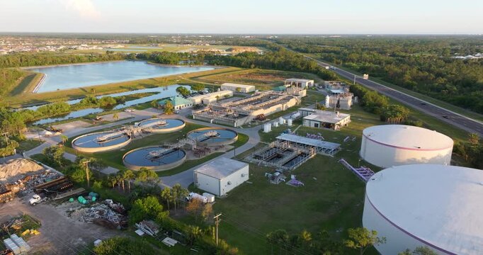 Aerial view of water treatment factory at city wastewater cleaning facility. Purification process of removing undesirable chemicals, suspended solids and gases from contaminated liquid.