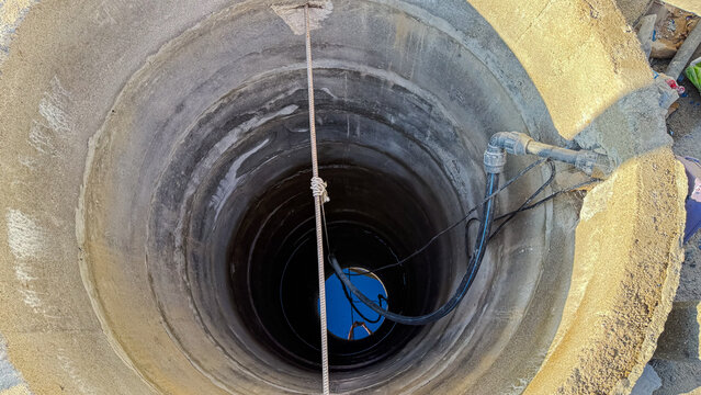 Open well with water at the bottom