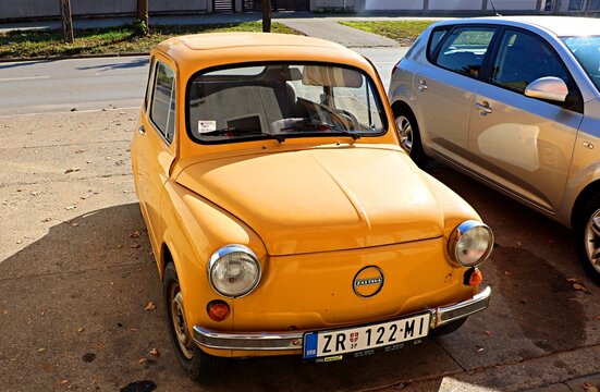 Retro car of the Zastava brand, bright yellow color