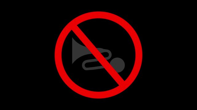A red circle with a diagonal line through a gray symbol of a microphone with a curly cord