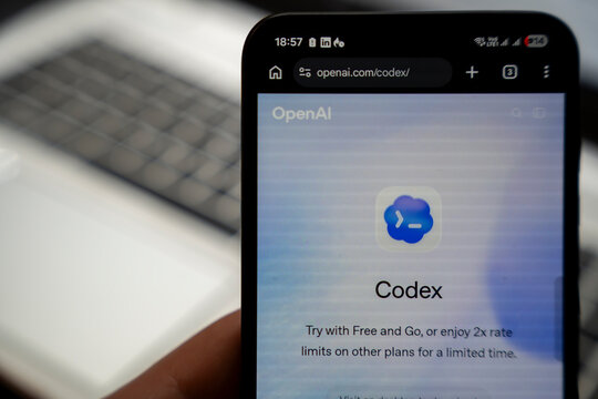 Warsaw, Poland - Feb 3, 2026: Close-up of a smartphone displaying the OpenAI Codex webpage. The device highlights modern technology and digital innovation in a minimalistic environment.