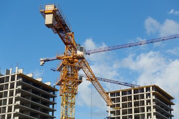 Buildings construction and crane. Residential Buildings
