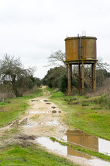 Abandoned historic railway station of Arraiolos, Portugal, showcasing rustic architecture, rural landscape and nostalgic atmosphere of a former train line in the Alentejo region.