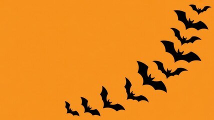 Obraz premium Halloween bats flying in orange background