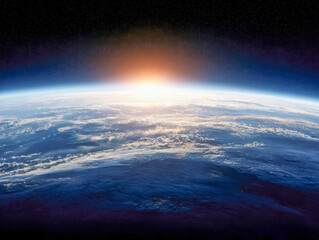 Fototapeta premium Stunning view of the sun rising over Earth?s atmosphere with visible clouds and deep space background highlighting the planet?s curvature and natural beauty
