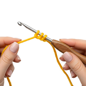 Hands crocheting with yellow yarn and crochet hook isolated on transparent background