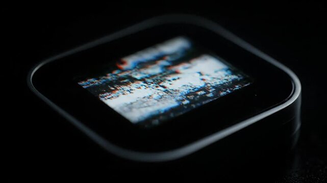 Close-up of a digital display shows green numbers, including 1285 and 185.4. Device in low light shows digital display with green numerals.