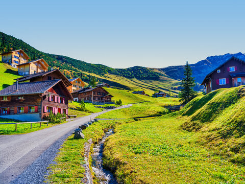 Road and Stream Winding Through Malbun Alpine Village