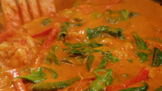 Tamarind red prawn curry cooking, shrimps in tomato ginger sauce, asian kitchen, Chinese restaurant.