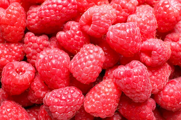 Fresh sweet ripe raspberries as background, closeup