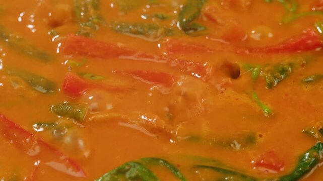 Tamarind red prawn curry cooking, shrimps in tomato ginger sauce, asian kitchen, Chinese restaurant.