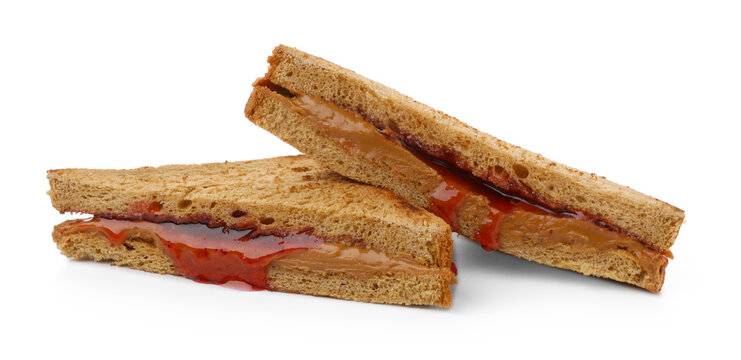 Yummy sandwiches with peanut butter and jam isolated on white