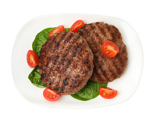 Naklejka premium Delicious grilled meat patties, tomatoes and spinach isolated on white, top view