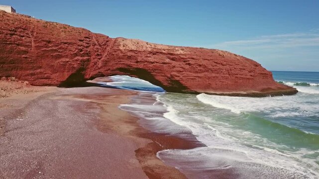 Aerial view on Legzira beach with arched rocks on the Atlantic coast in Morocco, 4k