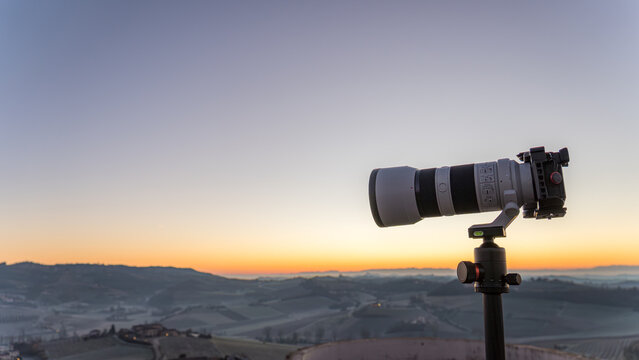 Telephoto lens captures sunrise over Italian hills