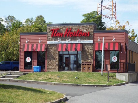 Ottawa, ON, Canada-July 11,2025: The storefront of "Tim Hortons" at 1800 St. Laurent Blvd.