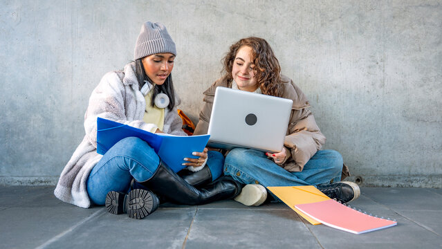 College students studying together outside on campus