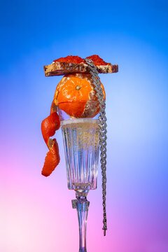 Luxury champagne with citrus, caviar, and jewelry