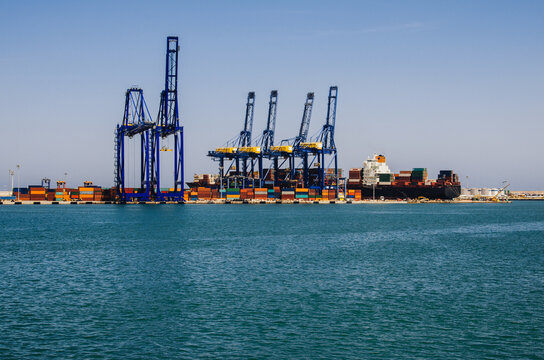 Container terminal and cranes at a coastal port