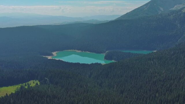 Aerial view of Black Lake in mountain Durmitor park at summer, Montenegro, 4k
