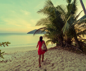 Woman walk on the beach 
