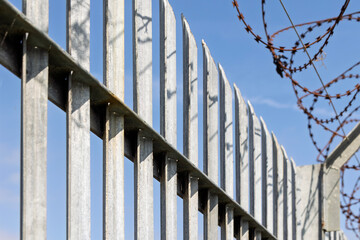 Industrial Metal Fence with Razor Wire and Security Barrier