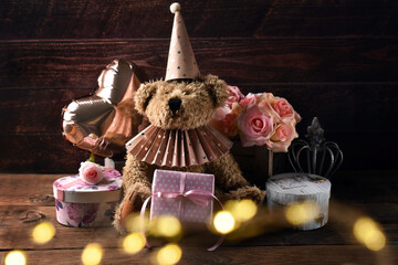 Vintage style teddy bear celebrating birthday or Valentines Day
