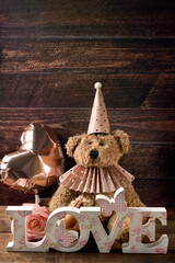 Valentine card with vintage style teddy bear and LOVE decor