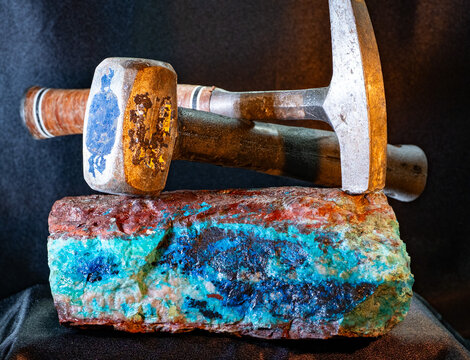 Arizona Copper Mineral Specimen featuring chrysocolla, malachite, shattuckite, azurite, cuprite, tenorite and miner tool props.