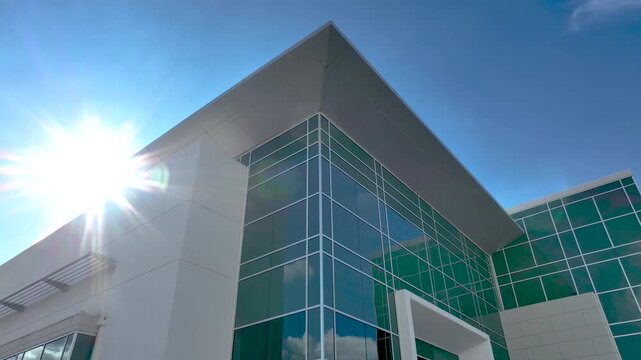 4K Aerial View of New Commercial Industrial Building Facade.