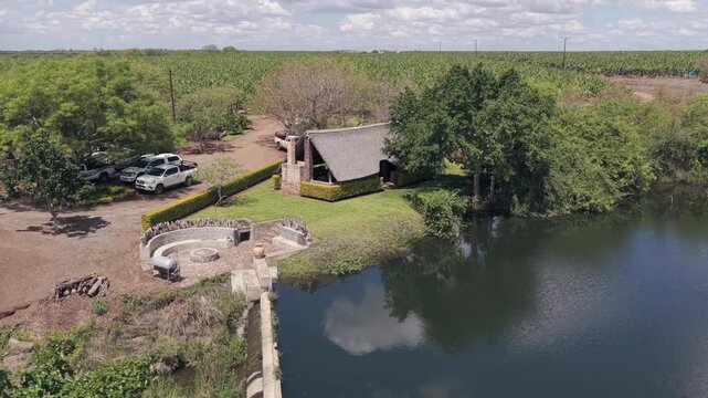 Flyover braai boma at banana plantation irrigation reservoir dam
