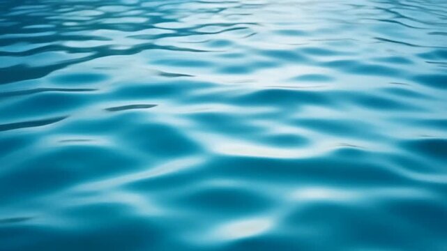 Seamless Loop of Smooth Aqua Blue Liquid Dynamics with Gentle Ripples and Soft Reflections for Beauty and Environmental Web Backgrounds