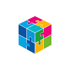 Colorful cube formed of puzzle pieces, interconnected for complete solution