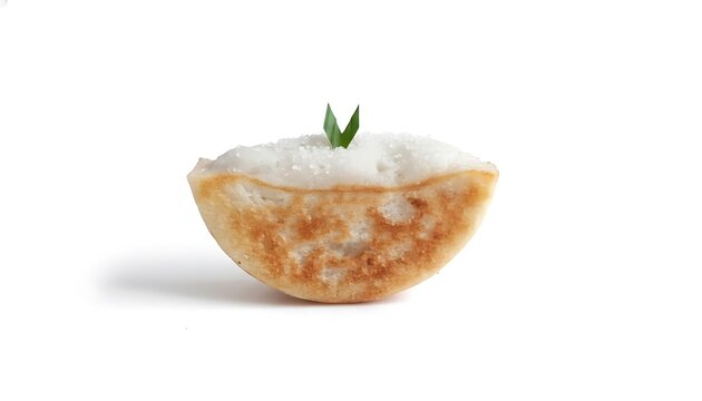 Traditional Kue Pocong dessert with rice filling and leaf garnish in a coconut shell