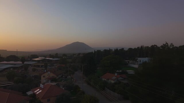 Mount Tabor in Israel stands majestically behind the green agricultural fields of Kfar Kish and Shibli.
