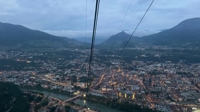 Timelapse of a cable car ride over the city with mountains behind, Trento, Trentino, Alto Adige, Italy, May 2025