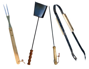 collection of four barbecue tools: fork, spatula, skewer, and tongs, ready for outdoor grilling and culinary use.