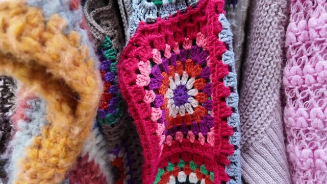Colorful knitwear display in local shop