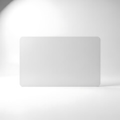 Blank white rectangular card with rounded corners in a studio