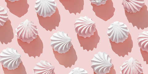 Minimal style linear pattern pastel pink white homemade marshmallow meringues. Zefir dessert as pink banner. Top view zephyr, pastel colored sweet dessert, romance holiday mood, creative still life