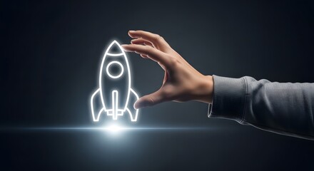 A glowing rocket ship being controlled by a hand