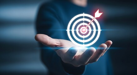 A person holding a glowing target with an arrow in the center