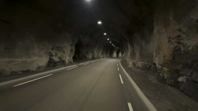 Traveling Through A Narrow Tunnel Connecting Eikesdalen And Sunndalsora In Aursj&oslash;vegen, Norway. POV Shot