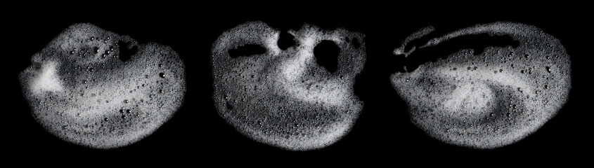 top view liquid white foam soap, shampoo, or shower gel. Abstract bubbles. isolated on black background. Clean concept, cosmetic visuals for a suds product. realistic soap texture with detailed bubble