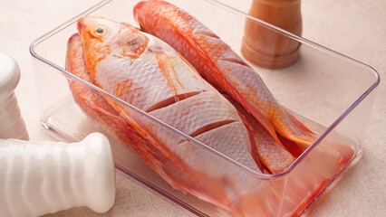 Ikan Nila Merah, Raw red tilapia fish is a kind of freshwater fish consumption