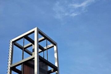 Modern Steel Frame Architecture Against Blue Sky.