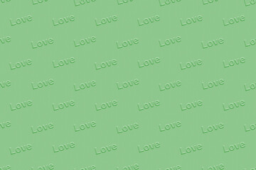 Soft green background with embossed Love lettering for organic concept