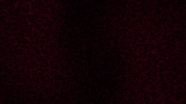 Abstract textured background with dark red and black gradient pattern